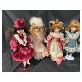 Four Porcelain Collector Dolls