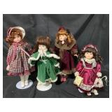 Four Porcelain Collector Dolls