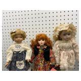 Three Porcelain Dolls
