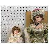 Two Porcelain Dolls in Formal Attire