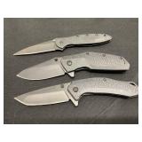 Three Kershaw Folding Knives