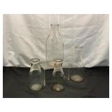 Four Vintage Clear Glass Milk Bottles