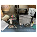 Office Supplies With Black Carrying Crate.