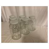Six Clear Glass Jars with Lids