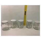 Five Glass Storage Jars with Lids