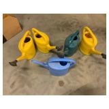 Five Plastic Watering Cans