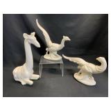 Three White Ceramic Figurines