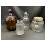 Four Glass Jugs and Jars