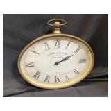Oval Metal Wall Clock with Roman Numerals