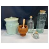 Ceramic Jar, Glass Bottles, and Wooden Mortar