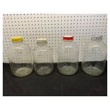 Four Glass Jars with Lids