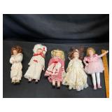 Five Porcelain Dolls in Period Dresses