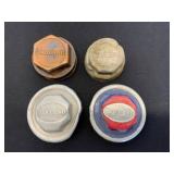 Four Oakland Auto Hubcaps (1907-1931)