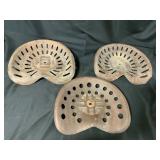 Three Cast Iron Tractor Seats