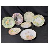 Seven Hand-Painted Porcelain Plates