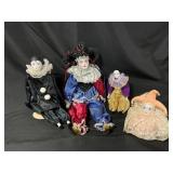 Four Porcelain Harlequin Dolls