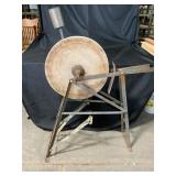 Antique Grinding Stone on Metal Frame