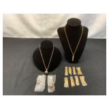 Two Gold-Tone Necklaces with Pendants