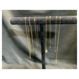 Seven Gold-Toned Necklaces