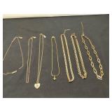 Seven Gold-Tone Necklaces