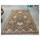 Brown Area Rug with Floral Pattern