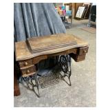 Treadle Sewing Machine with Carved Cabinet