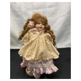 Porcelain Doll with Crochet Clothing