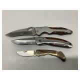 Three Folding Knives with Wood Inlays