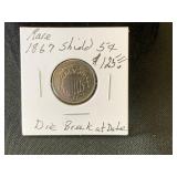1867 Shield 5 cent Die Break at Date