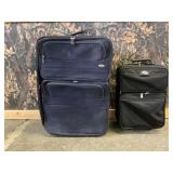 Olympia and American Tourister Suitcases