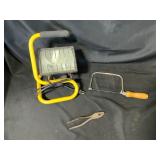 Work Light, Hack Saw, and Pliers