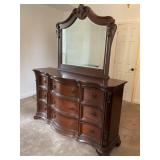 Traditional 9-drawer dresser and matching mirror