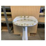 White porcelain Pedestal Sink.