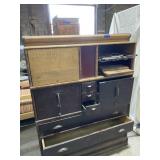 Vintage multi-tiered wooden storage cabinet