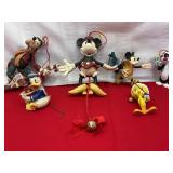 A collection of VTG holiday Disney characters