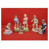 Group of 6 Figurines; Royal Doulton "She loves me
