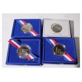 4 US 1986 Liberty Half Dollars in original boxes.