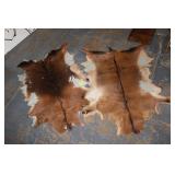 Pair of Goat skin Rugs 38' & 39' long