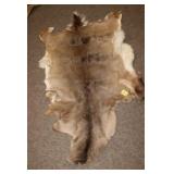 Natural tone Deer Hide Rug approx 64'