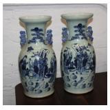 A pair of antique chinese vases with hole in base