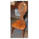 Antique tiger oak Chair w/ carved cherub back