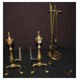 A group of brass andirons & firetools