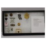 Display of USA insignia and hat badge