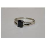 14 KT white gold sapphire ring that features a