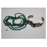 925 sterling bracelet along with a long