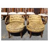 A Pair of MCM Scroll Arm Chairs