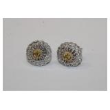 18KT wg diamond earring that features