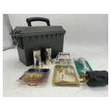 NEW AMMUNITION BOX WITH MISC ITEMS