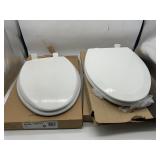 4 OVAL TOILET SEATS-NEW