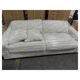 WHITE LOVESEAT WITH WOODEN LEGS